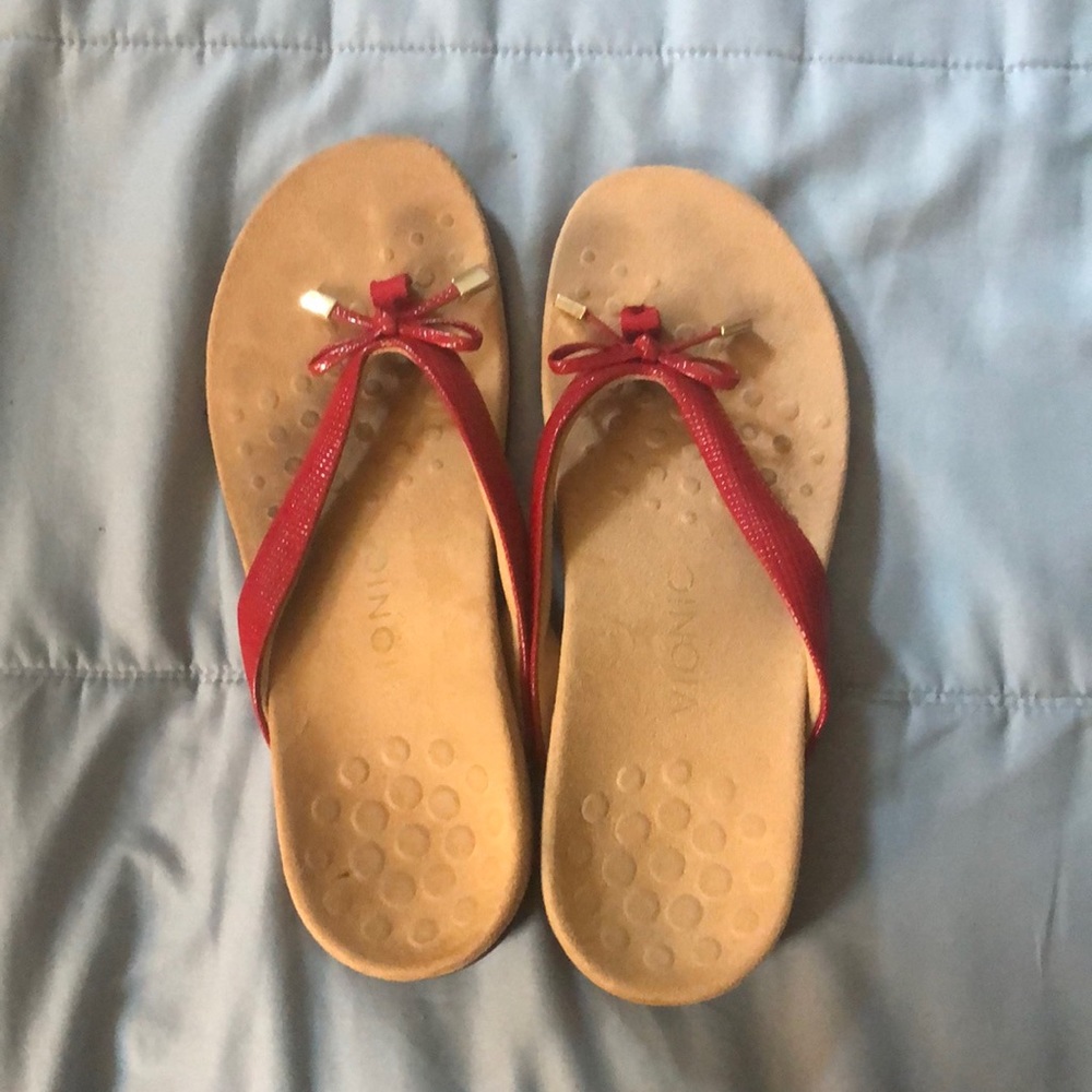 Beautiful red flip flops. Just can’t wear flip flops anymore.